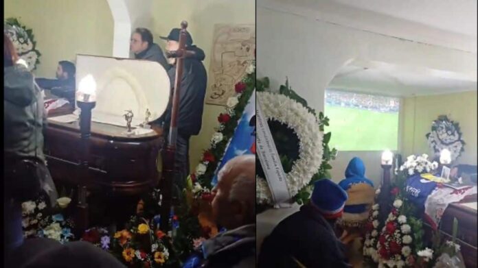 Family Watch Football Sitting Next To Coffin; Unusual Video Goes Viral-Watch